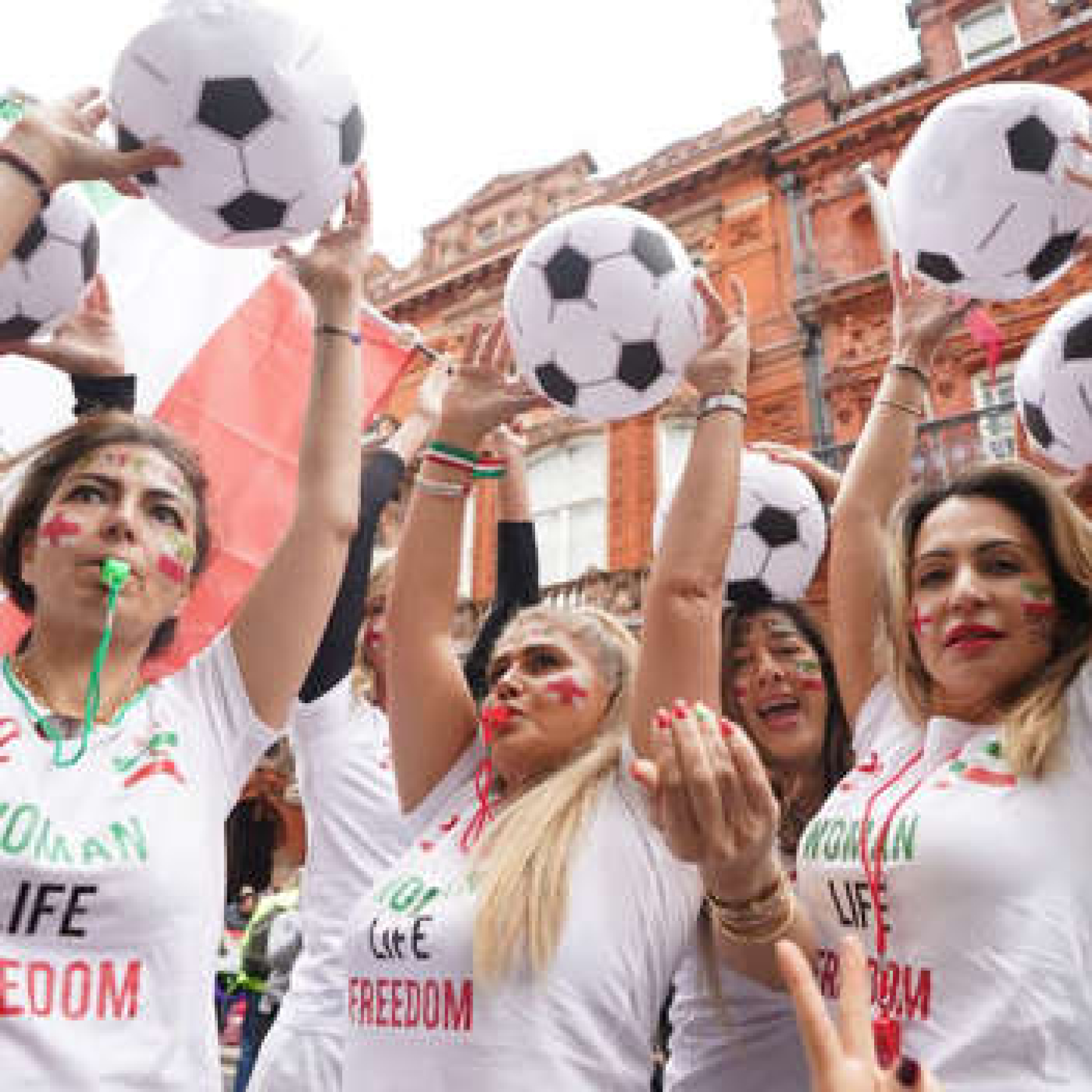 A group of 22 Iranian women played football in Westminster to highlight what they called a 