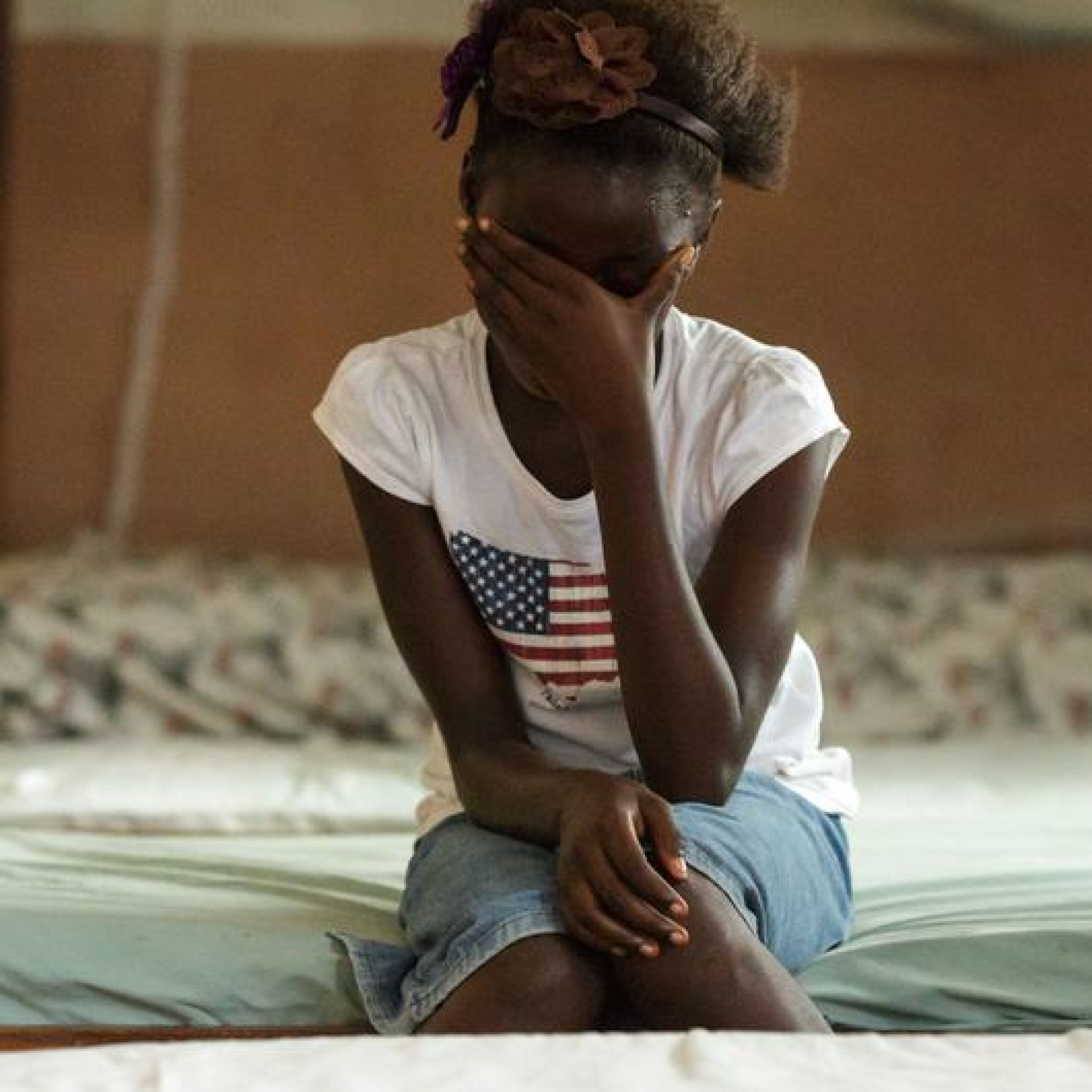 A ten-year-old girl ran away from home after discovering her family planned to train her as a FGM/C practitioner. She now lives in a UNICEF safe house in Port Loko, Sierra Leone, and is attending scho