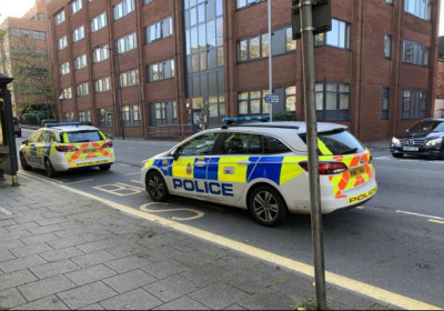 A police cordon is in place near the scene