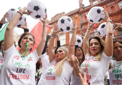 A group of 22 Iranian women played football in Westminster to highlight what they called a "gender apartheid" in the country