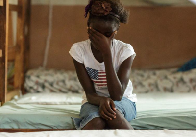 A ten-year-old girl ran away from home after discovering her family planned to train her as a FGM/C practitioner. She now lives in a UNICEF safe house in Port Loko, Sierra Leone, and is attending scho